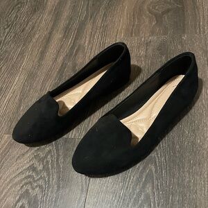 Black slide on dress shoes for women.